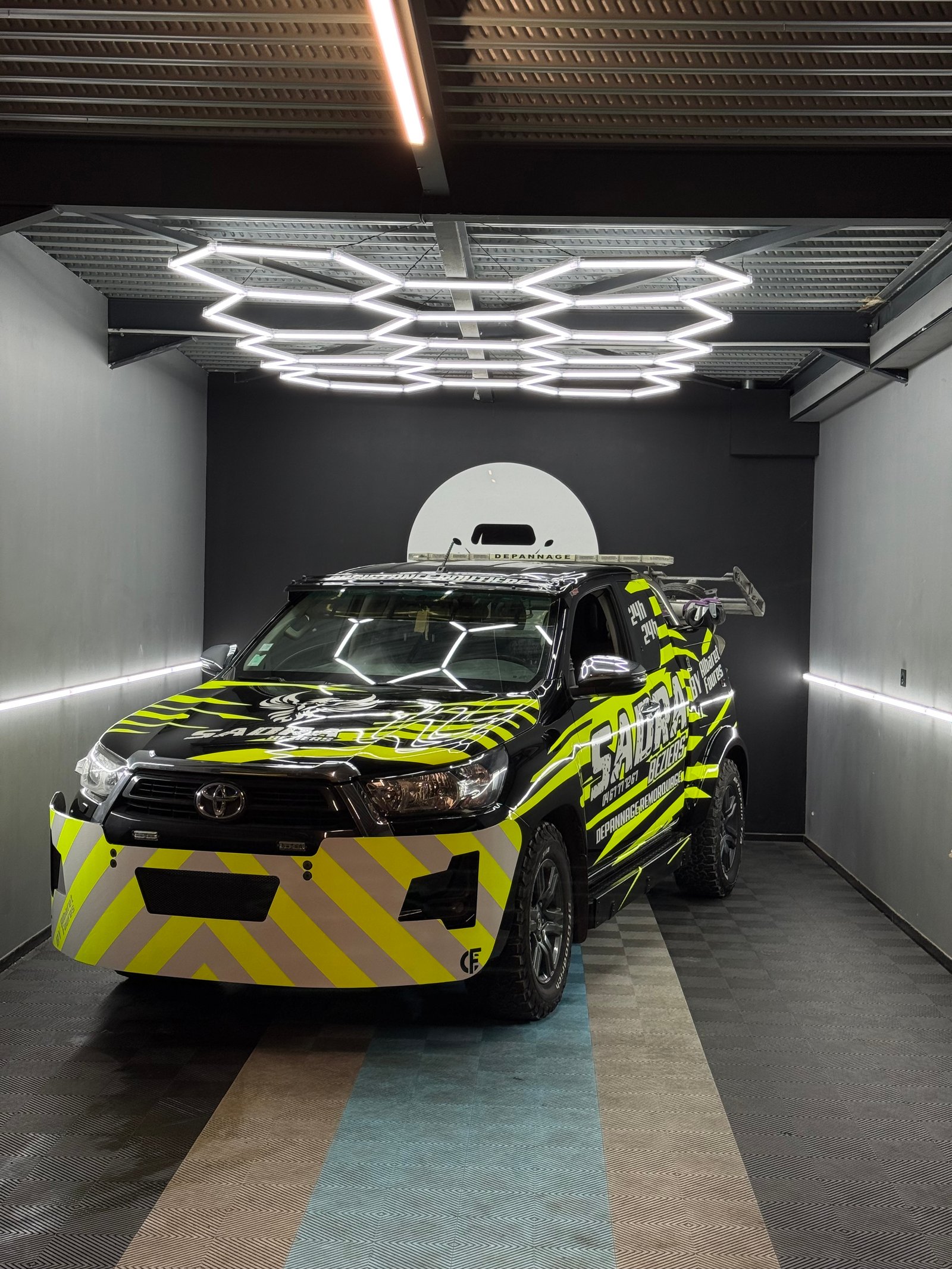 Toyota Hilux covering commercial racing